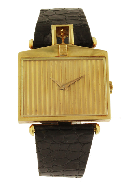 Corum Rolls Royce 18k Yellow Gold Watch with gold plated buckle.