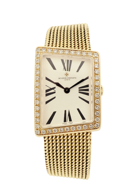 Vacheron & Constantin "MCMLXXII" Lady's 18k Yellow Gold and Diamond-set Asymmetrical bracelet watch, w/ original certificate, service booklet, envelope and box.