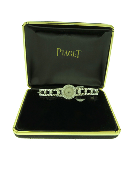 Piaget 18k White Gold, back wind lady's 1960's with Diamond Bezel