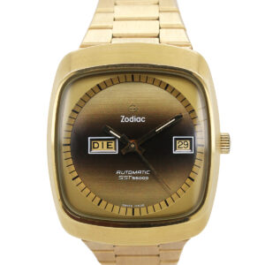 Zodiac Stainless Steel & Gold Plated Auto Day-Date Bracelet Wristwatch c. 1970 with Original Box, Warranty, Instructions, & Hang Tag