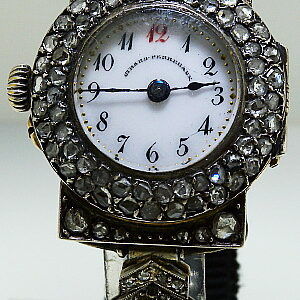 Silver,gold and diamond set Girard Perregaux