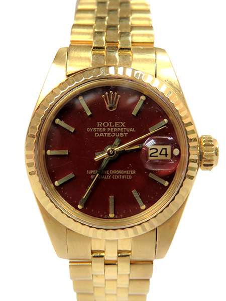 Rolex (Ref. 6917) Lady's 18k Yellow Gold Datejust with Stella Oxblood dial and jubilee bracelet watch, with original certificate, c. 1987