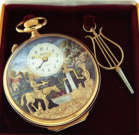 Arnex Swiss Gold Plated Open Face Musical Pocket Watch w/Automaton, pre-Reuge Edition, with original Arnex Box and lyre form key, c. 1980, 116.5g