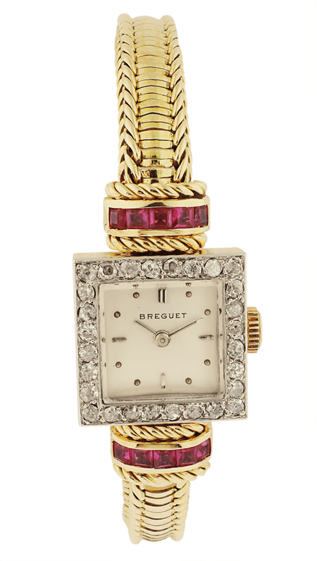 Breguet 18k Yellow Gold Ladies bracelet watch with ruby, diamond and platinum bezel. Circa 1950