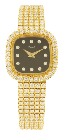 LADY'S FINE 18K GOLD AND DIAMOND-SET CUSHION-SHAPED BRACELET WATCH, CIRCA 1980