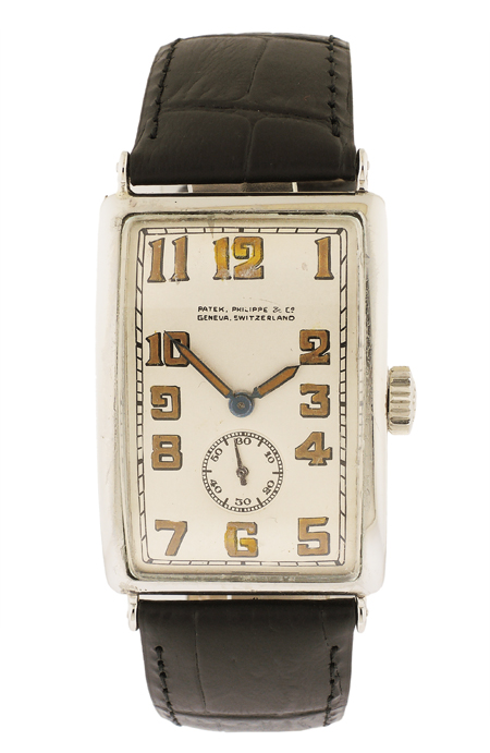 Patek Philippe 18k White Gold Large Rectangular Hinged curved wristwatch. Circa 1920