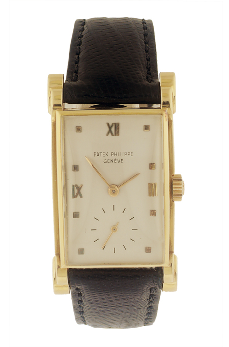 Patek Philippe Ref. 2415 18k Yellow Gold Rectangle wristwatch. Circa 1951