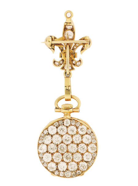 Tiffany 18k yellow gold ladies lapel watch, diamond-set stylized fleur-de-lys pin. c1900