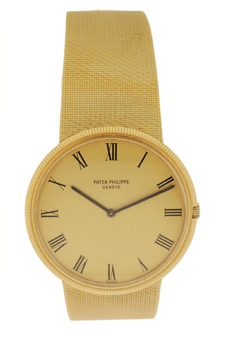 Patek Philippe Ref. 3388/1 Calatrava 18K Yellow Gold Men' s bracelet watch. Circa 1975.