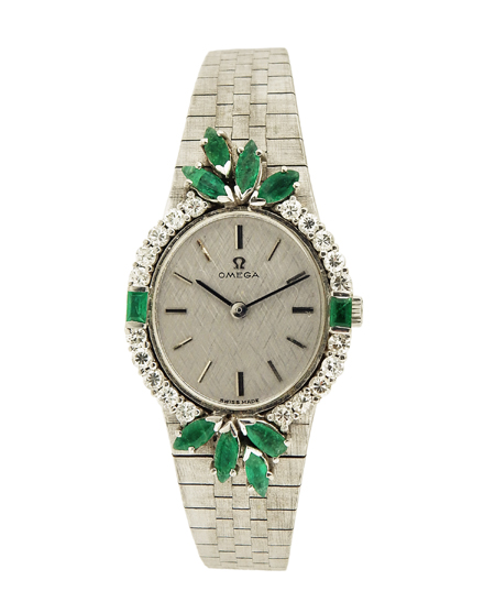 Omega (Ref. 1011) 18k White Gold Bracelet Ladies' Bracelet Watch, with Elegant Decorative Emerald & Diamond Bezel, c.1960s