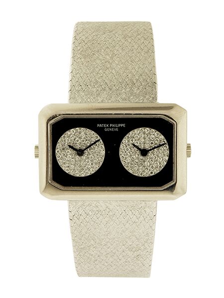 Unusual Patek Philippe (Ref. 4404/4) 18k White Gold, Onyx and Diamond set Dual Time Bracelet Watch, c. 1978, w/ extract