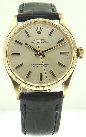 9k YG Oyster Perpetual Rolex With Engine Turn Bezel