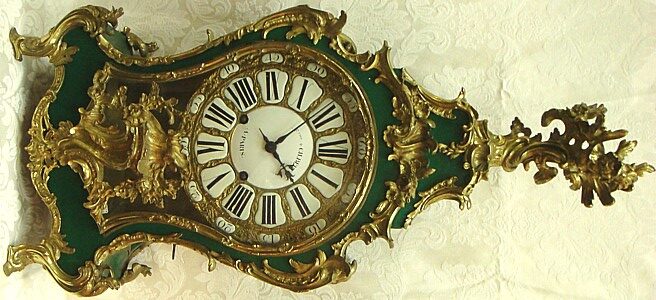 Franncois Gilbert A French Gilt Brass Table Clock