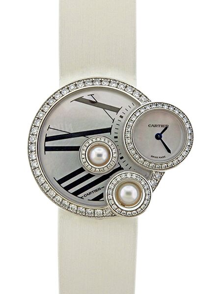 Highly Unusual Cartier (Ref.3053) 18k White Gold & Diamond Asymmetrical Ladies' Wrist Watch w/ Pearl and Mother of Pearl Dials, complete w/ box, manual and blank certificate.